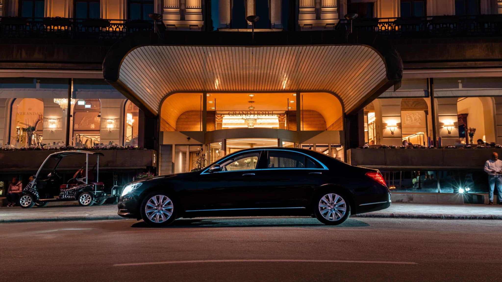 Mercedes-Benz S-Class at Grand Hôtel entrance, Stockholm, evening